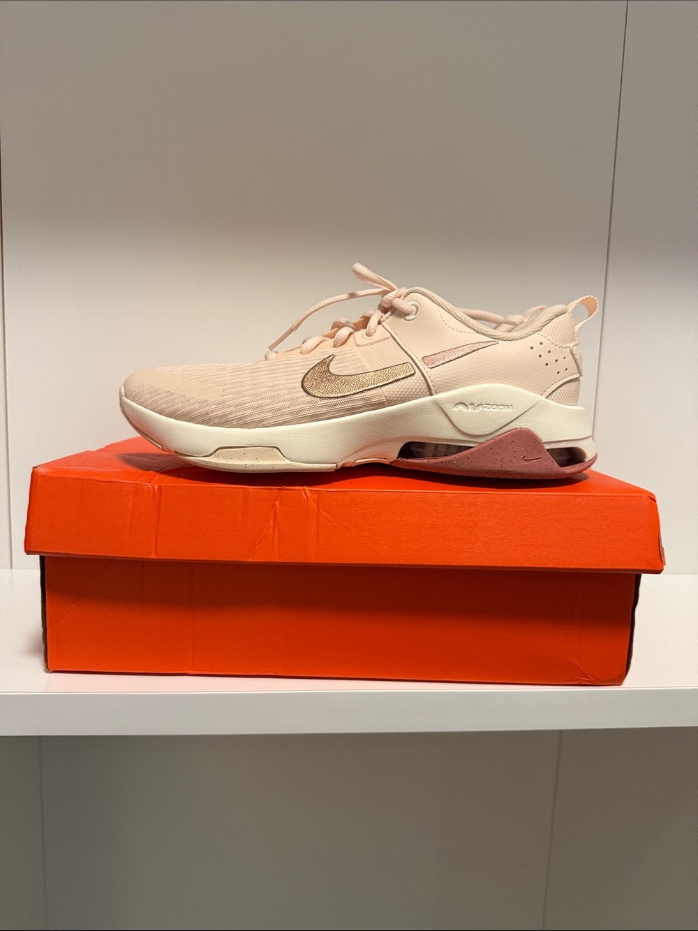 Nike Bella 6 Light Pink and Rose Gold Trainer